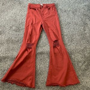 Burnt Orange Flare Jeans. Lightly Worn. No stains/rips